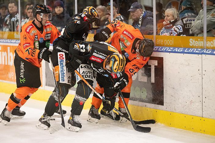Erik Kirchschläger (Moser Medical Graz 99ers), Brodi Stuart (Steinbach Black Wings Linz), Niklas Bretschneider (Steinbach Black Wings Linz), Michael Kernberger (Moser Medical Graz 99ers)   Steinbach Black Wings Linz vs Moser Medical Graz 99ers, 24. Runde, ICE Hockey League, Steinbach Black Wings Linz, Linz AG Eisarena 