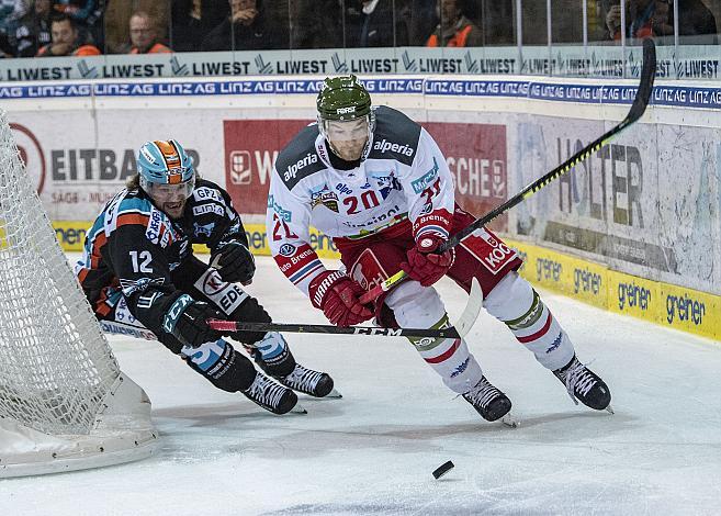 Im Bild Alexander Cijan (EHC Liwest Black Wings Linz), Dennis Robertson (HCB Suedtirol Alperia) Eishockey, EHC Liwest Black Wings Linz vs HC Bozen