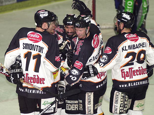 Ralph Intranuovo, Thomas Eichberger, Sven Klimbacher und Reid Simonton feiern
