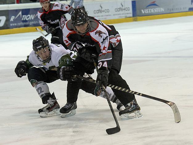 Gerald Kastner, Grizzleys Linz verteidigt gegen A. Hofbauer, Traun  Grizzlies Linz vs. Puckjaeger Traun