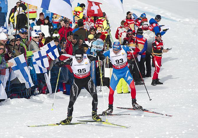 #95 Dario Cologna, SUI, und #95 Alexander Lekov, RUS; Nordische Ski WM 2013, Val di Fiemme, Tesero, 15km Herren